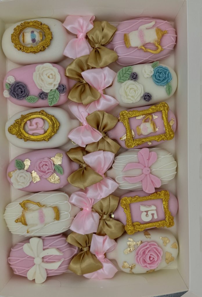 A decorated birthday treat box packed with custom sweets and finishing touches.